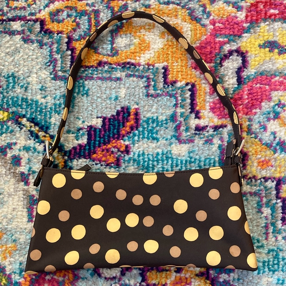 Cute little polka dot baguette shaped bag.